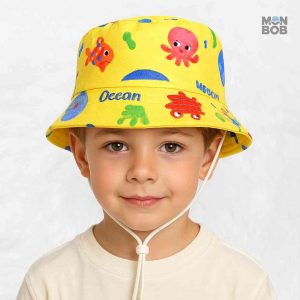 Accessoire tendance pour enfant, bob jaune en motif océan