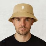 Bob Beige tendance, accessoire idéal pour les amateurs de golf