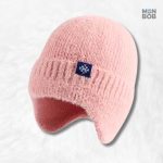 Bonnet en laine rose avec cache-oreilles pour un confort optimal