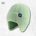Bonnet cache oreille en laine verte pour un confort optimal