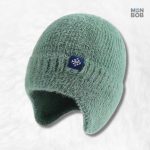 Bonnet cache oreille en laine verte foncée
