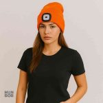 Accessoire de marche ou camping, bonnet lumineux en couleur orange