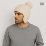 Accessoire chaud pour oreilles, bonnet crème avec pompon