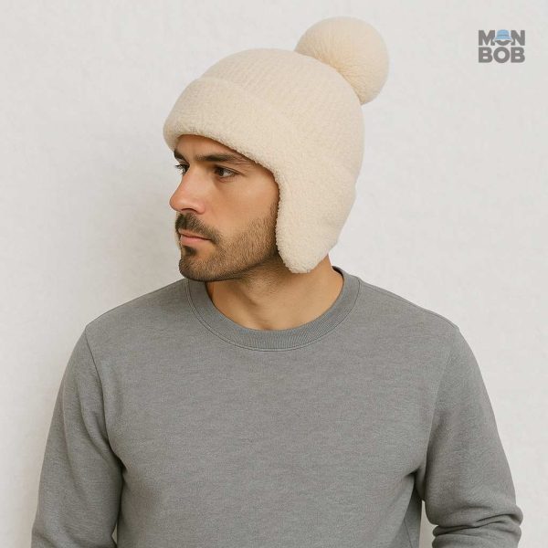 Accessoire chaud pour oreilles, bonnet crème avec pompon