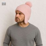 Bonnet rose avec pompon, idéal pour garder les oreilles au chaud
