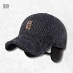 Casquette noire avec cache-oreilles pour un style fonctionnel