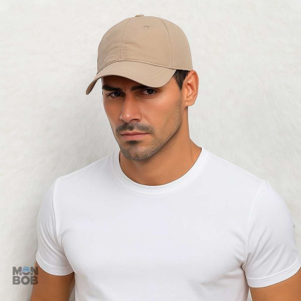 Casquette beige résistante à l'eau, idéale pour les activités en extérieur