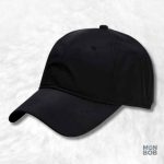 Casquette noire imperméable pour protection contre la pluie