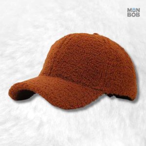 Casquette moumoute orange tendance pour un look décontracté