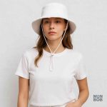 Chapeau d'été féminin en blanc, accessoire de mode parfait