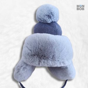 Chapka femme fourrure bleue élégante et chaleureuse